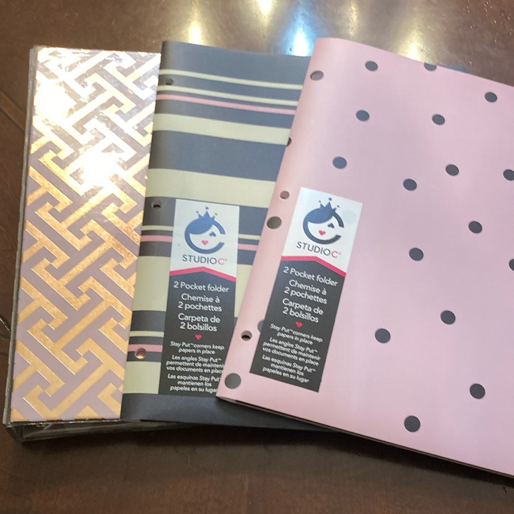 Studio C binder and two coordinating folders in pink, gold, black and beige.
